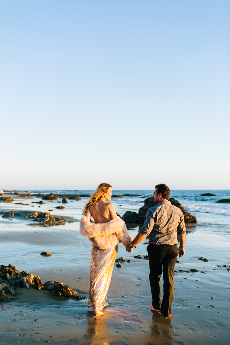 Bride to be in Vintage sequins dress on the beach for Engagement Photos