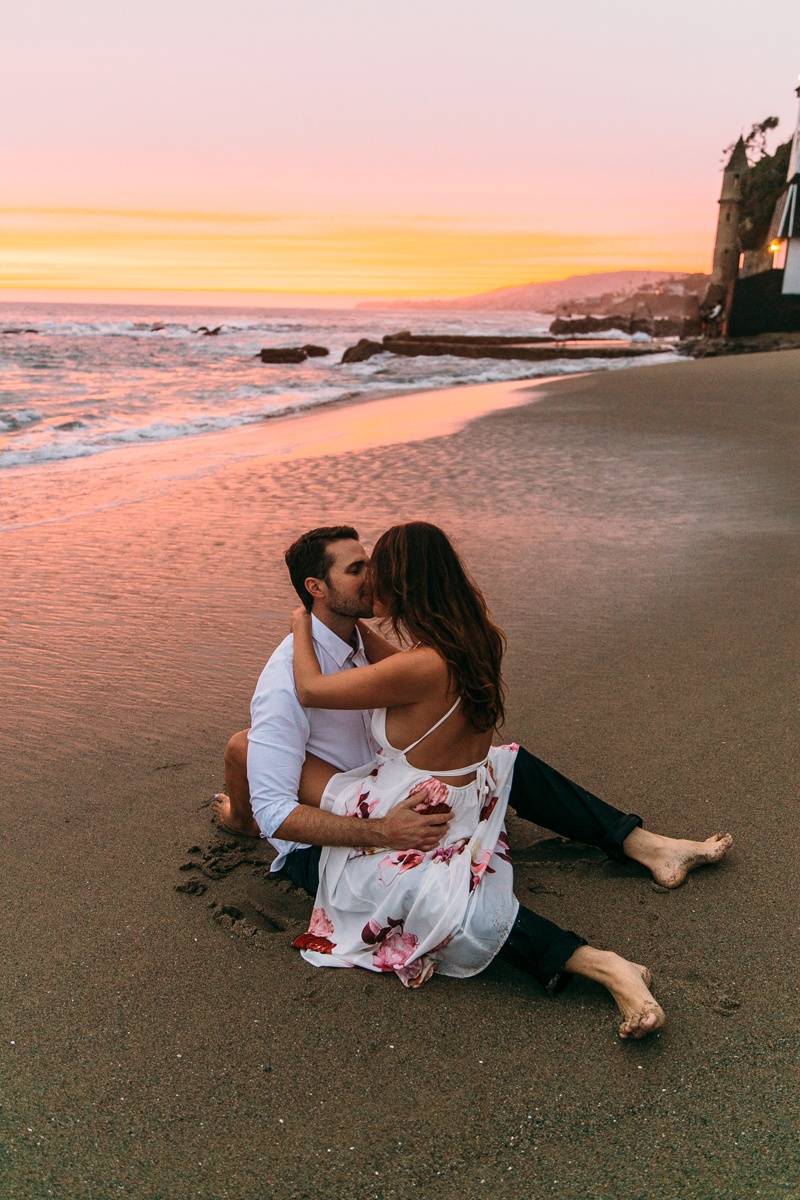 Romantic Engagement photos in Laguna Beach couple kissing in the water