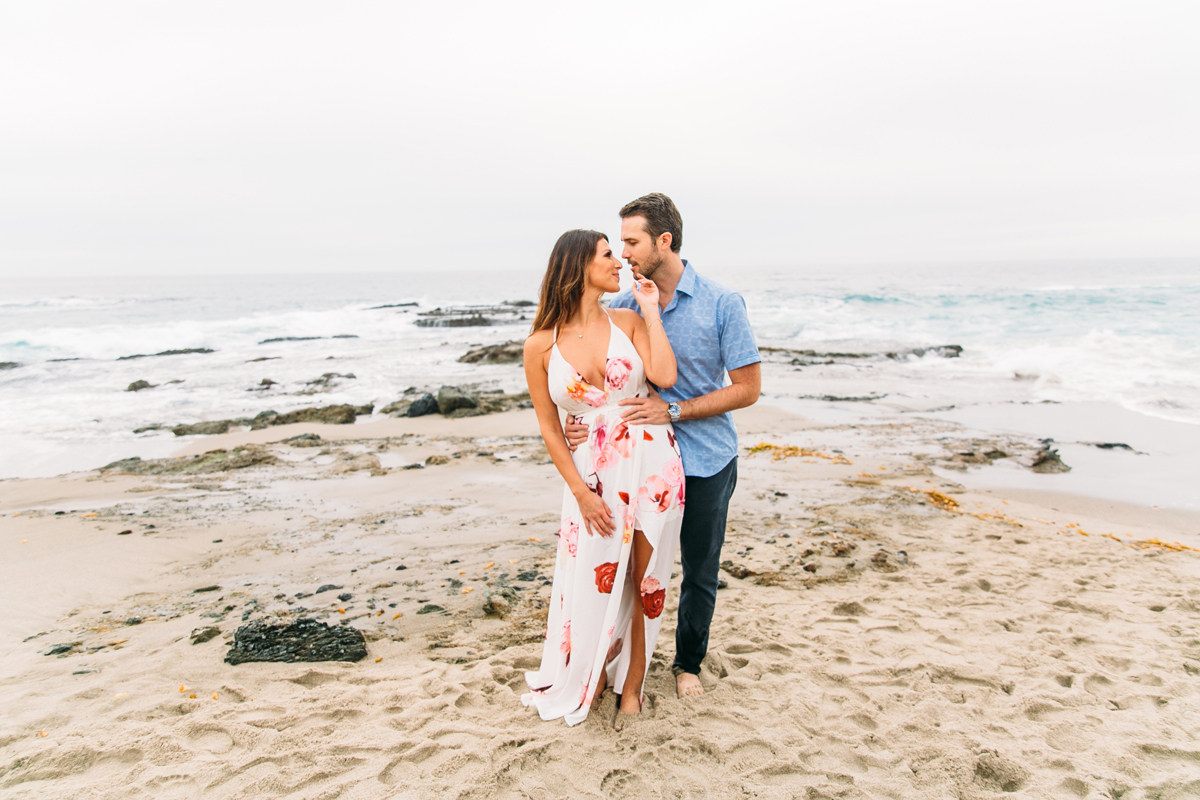 Romantic Engagement Photos on Victoria Beach with a castle