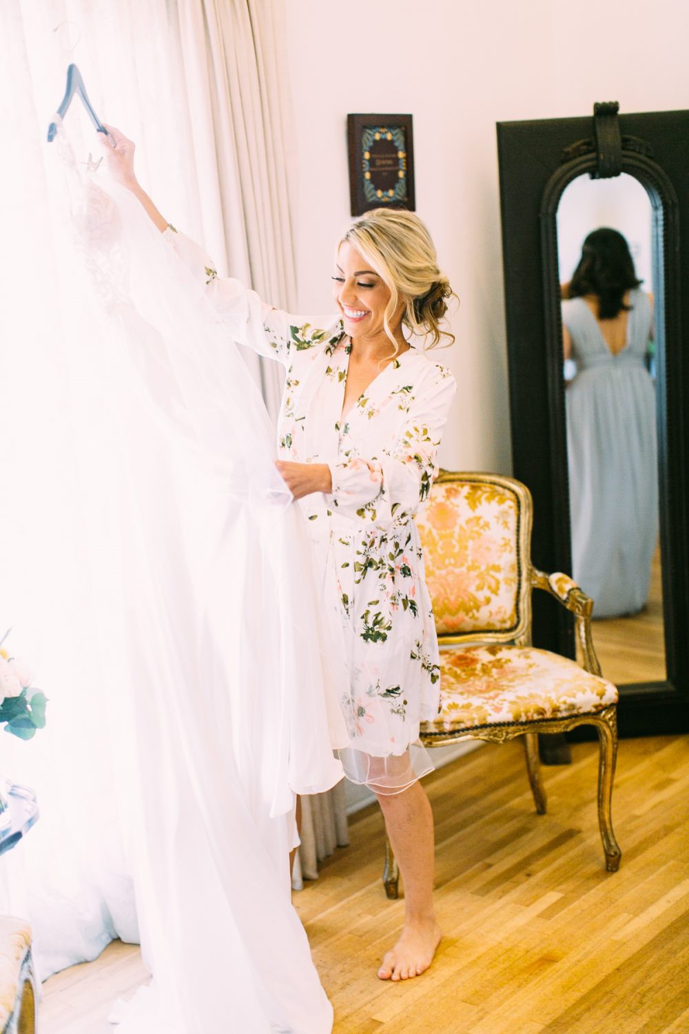 Bride excited to put her wedding dress on at Casa Romantica