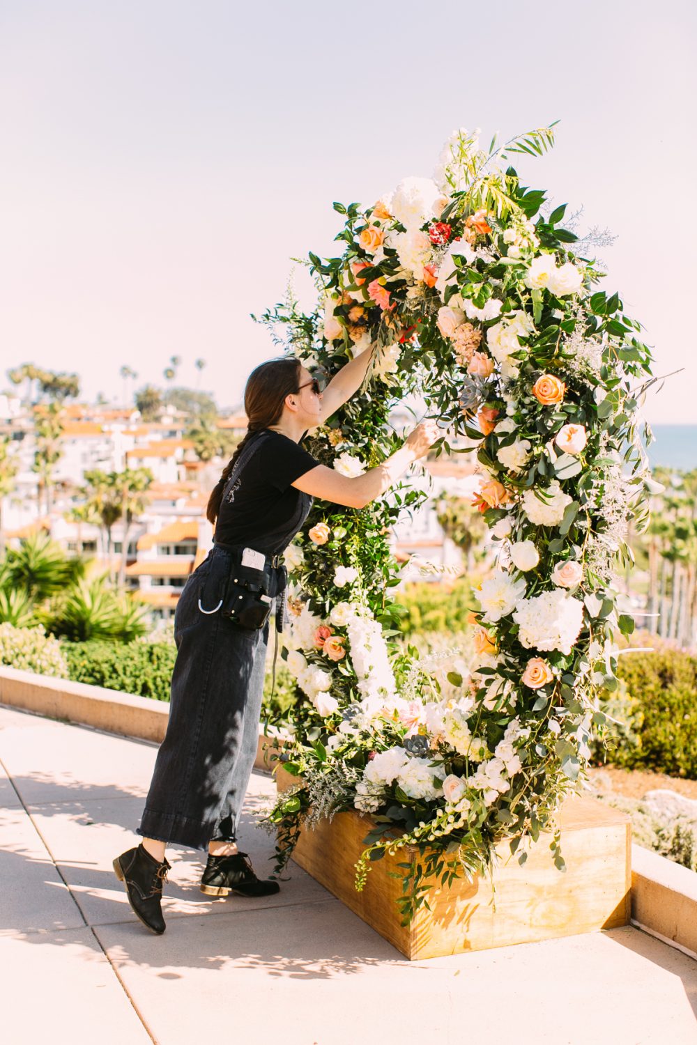 The Bloom Of time florals working on floral arch at case romantic