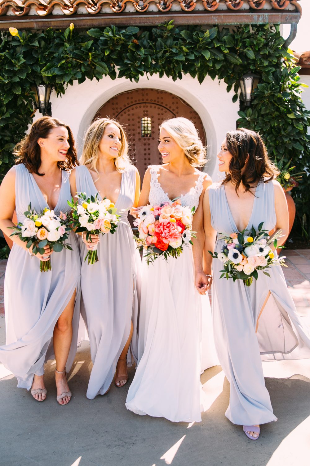 beautiful bridesmaids in front of Casa Romantica