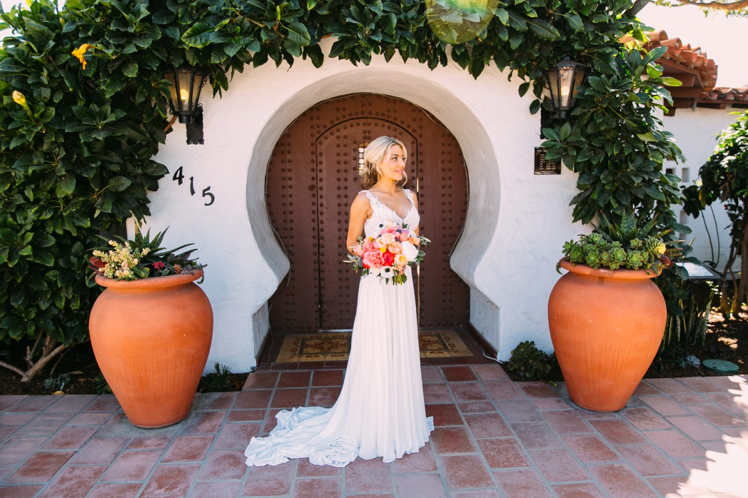 bride in front of Casa Romantica
